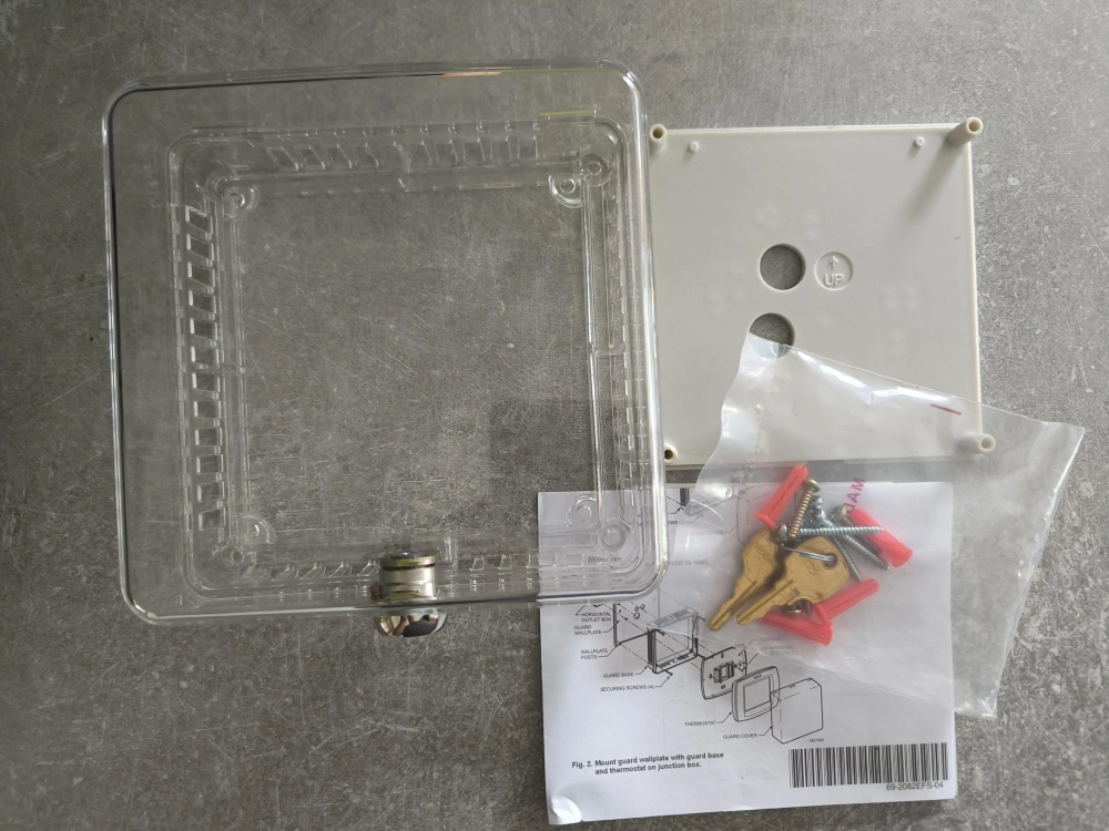 Ochranný univerzální uzamykatelný kryt na termostat Honeywell TG510A1001